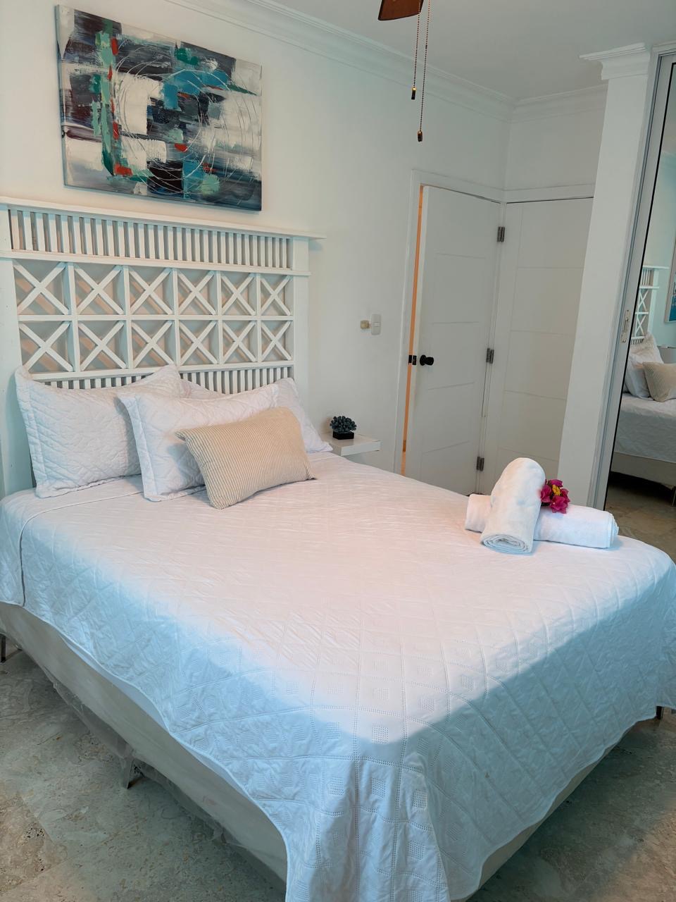 Handcrafted plaster cornices and coral stone finishes — luxury Dominican Republic villa for sale